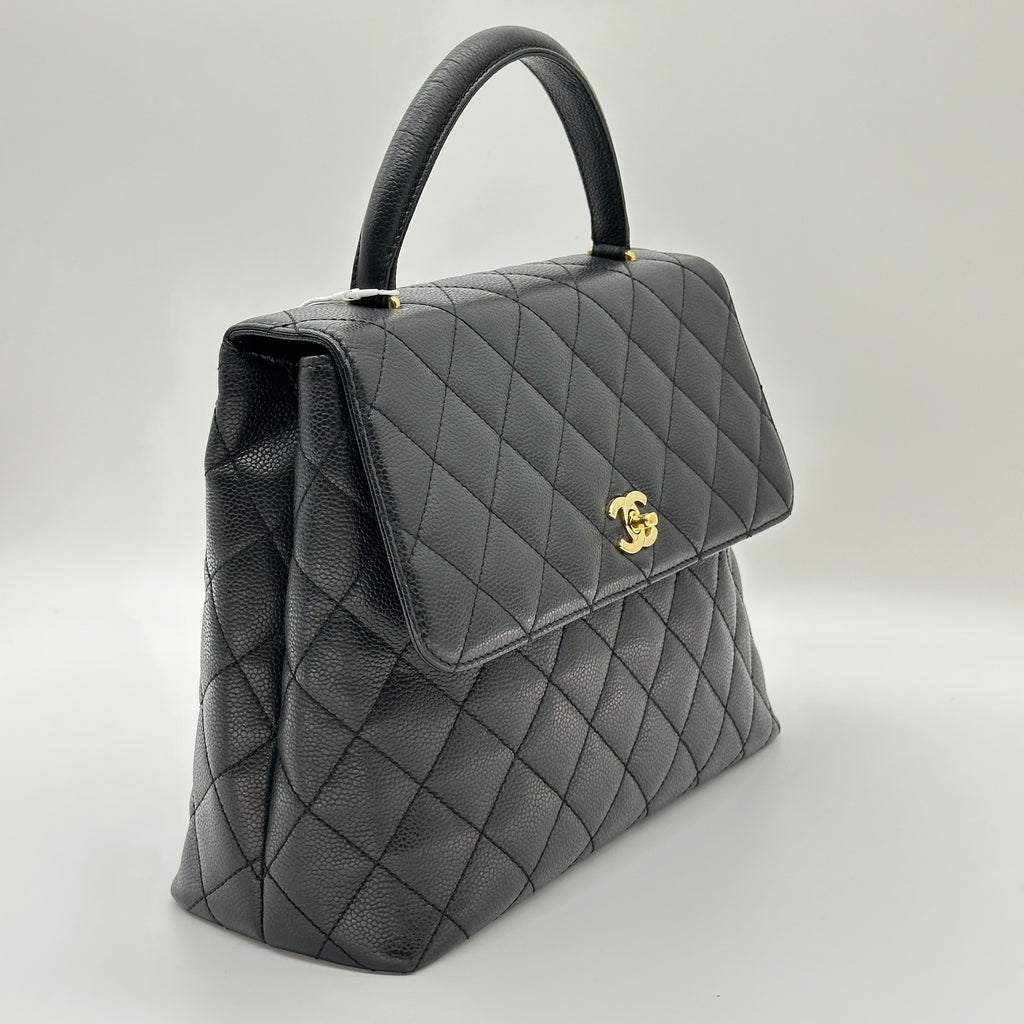 Sac à main Chanel Kelly avec poignée supérieure en cuir Caviar Matériel doré noir Matelasse Série 6