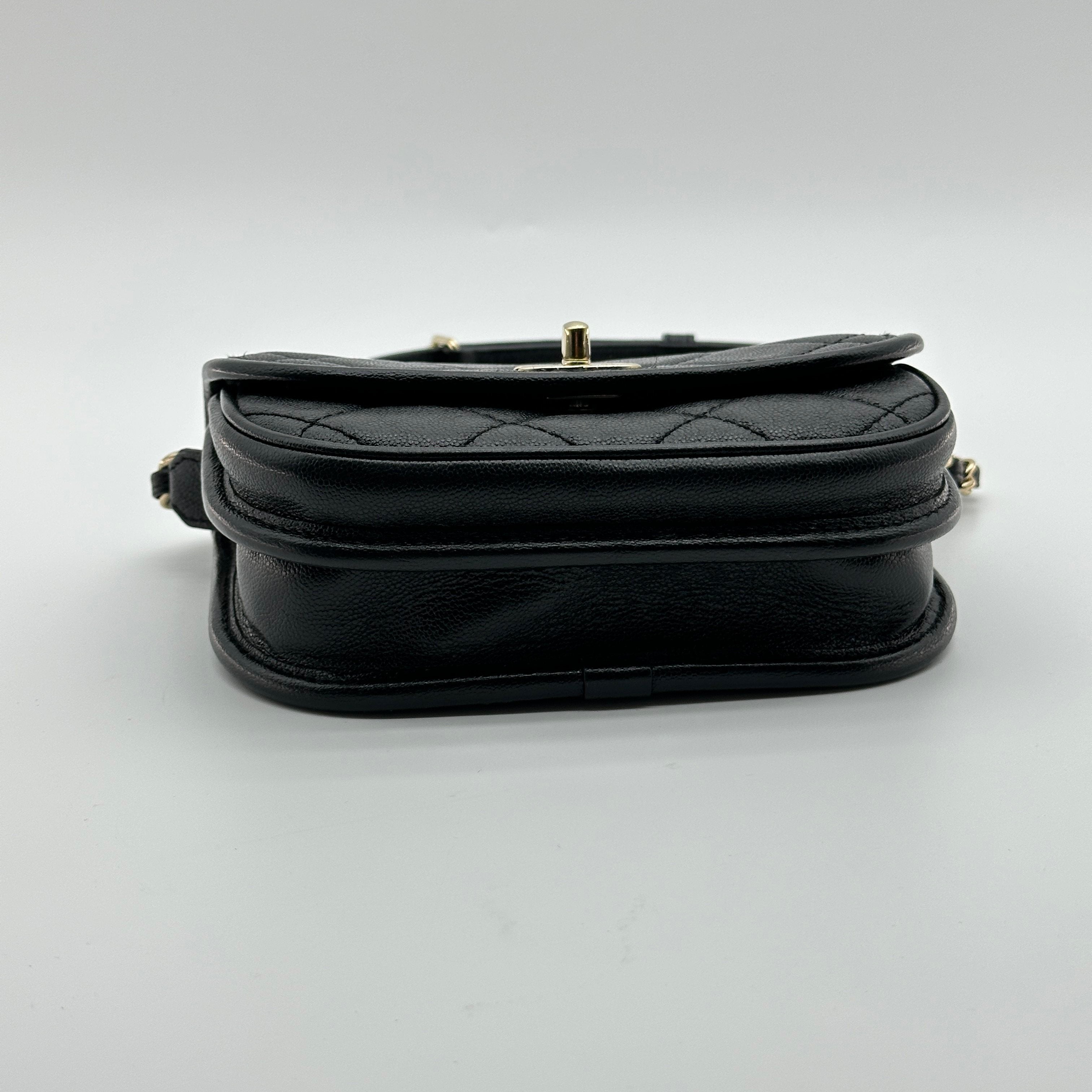 chanel black caviar quilted leather mini round messenger bag