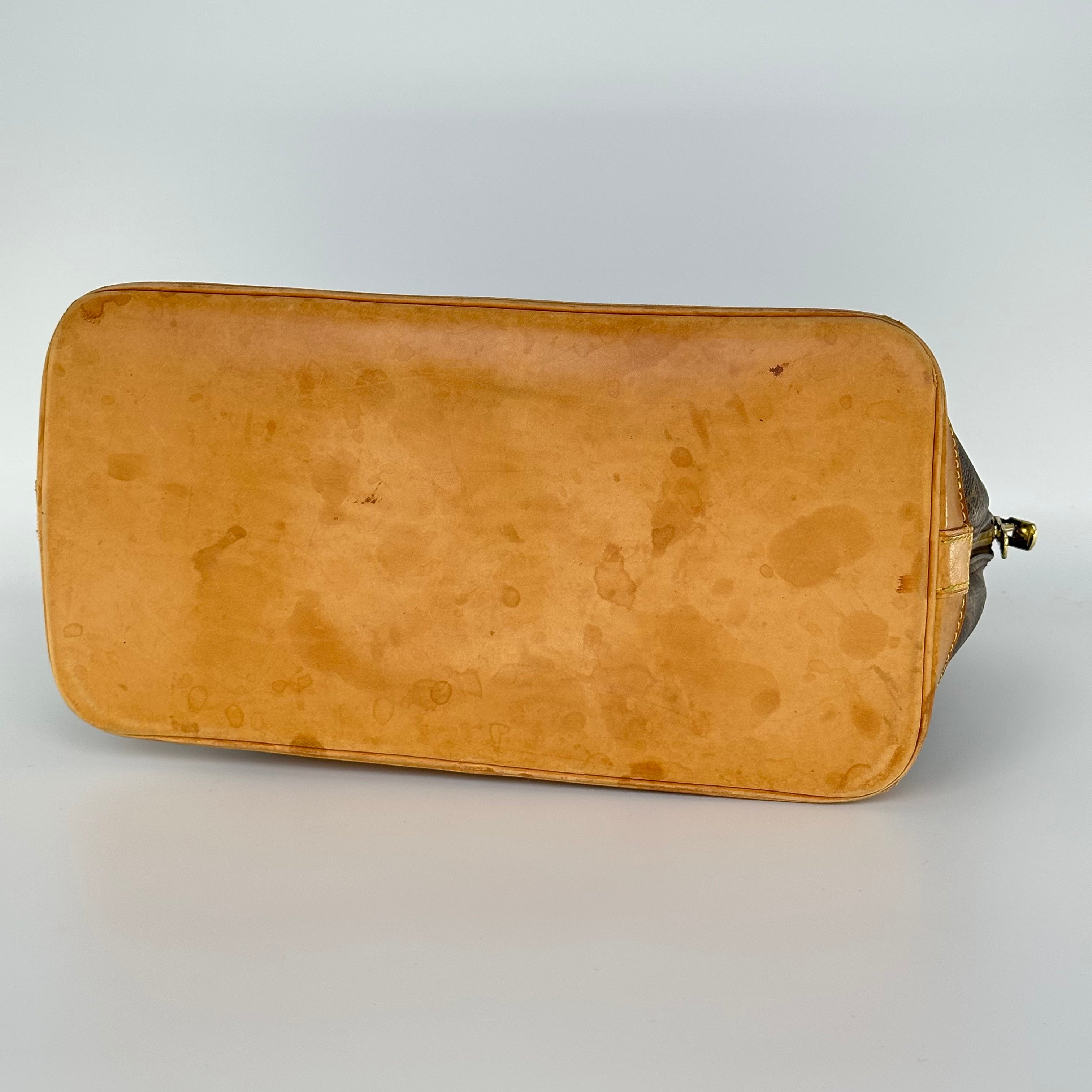 Louis Vuitton Alma Monogram Handbag M51130