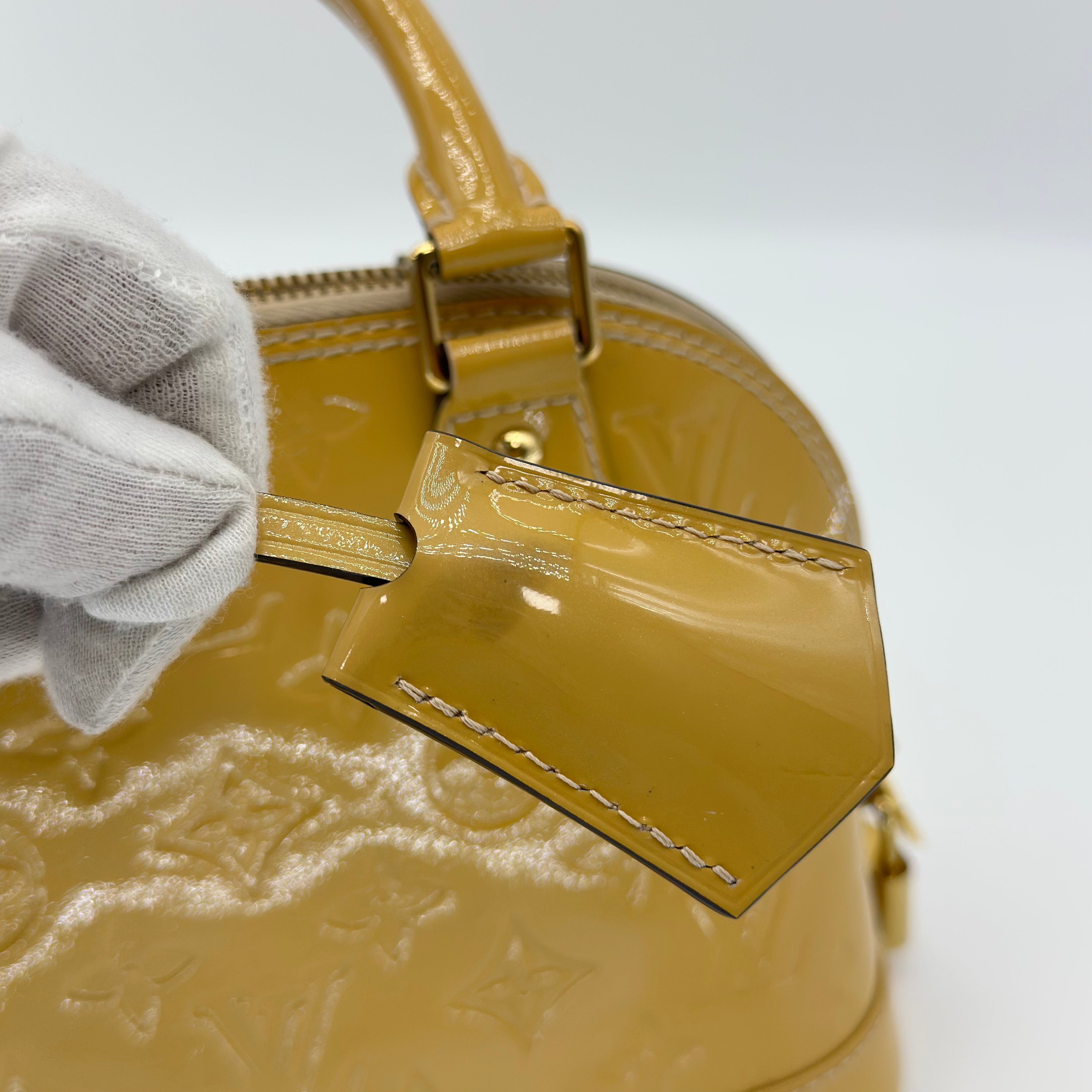 Louis Vuitton Alma Vernis Sac à coque en cuir verni Sac à bandoulière avec poignée supérieure M90101