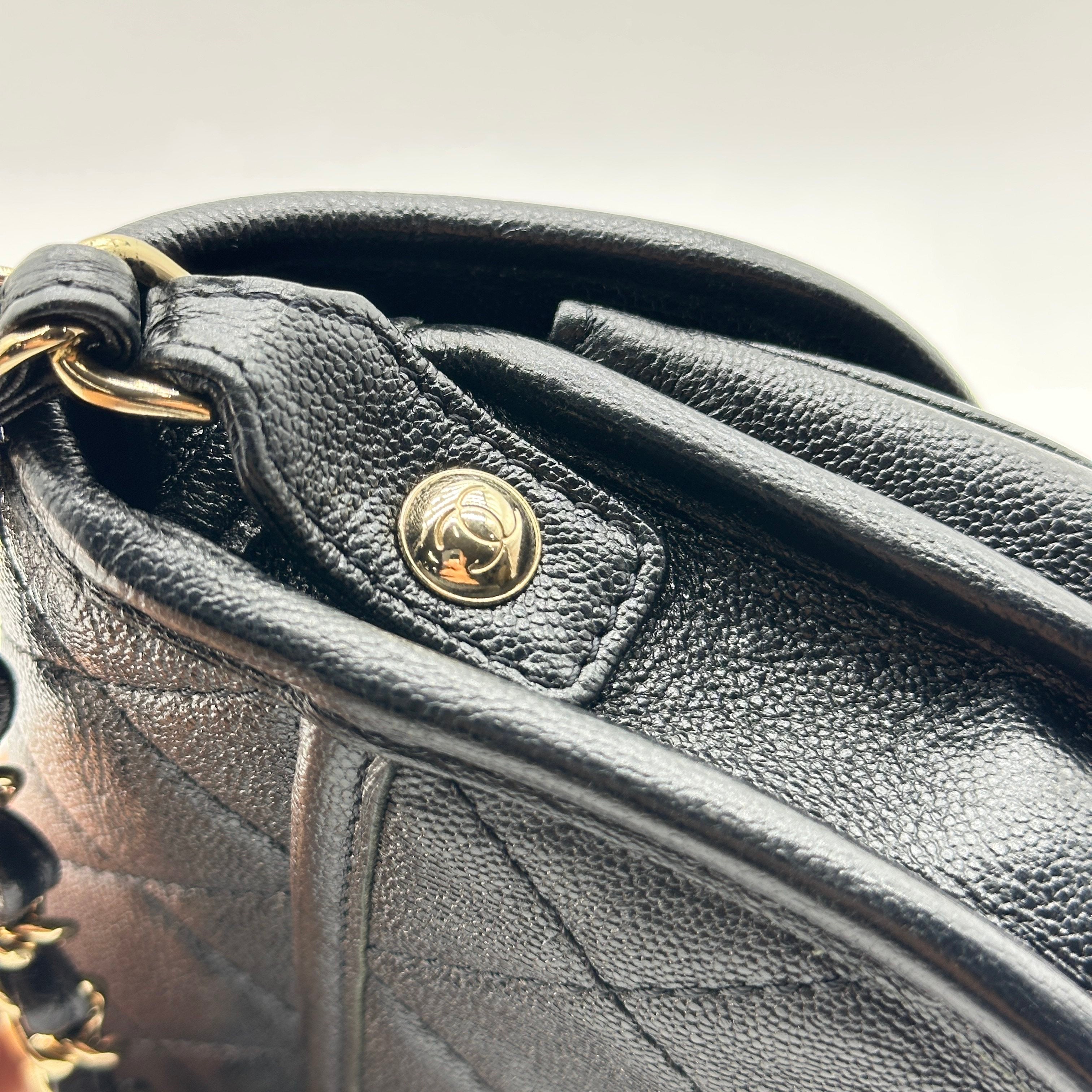 chanel black caviar quilted leather mini round messenger bag