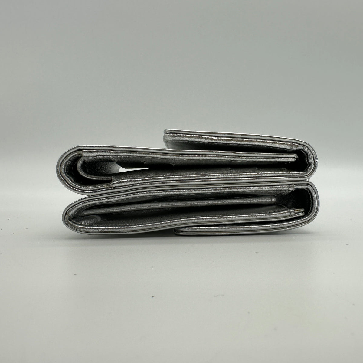 Chanel Icon Line Embossed Leather Metallic Silver Trifold Wallet