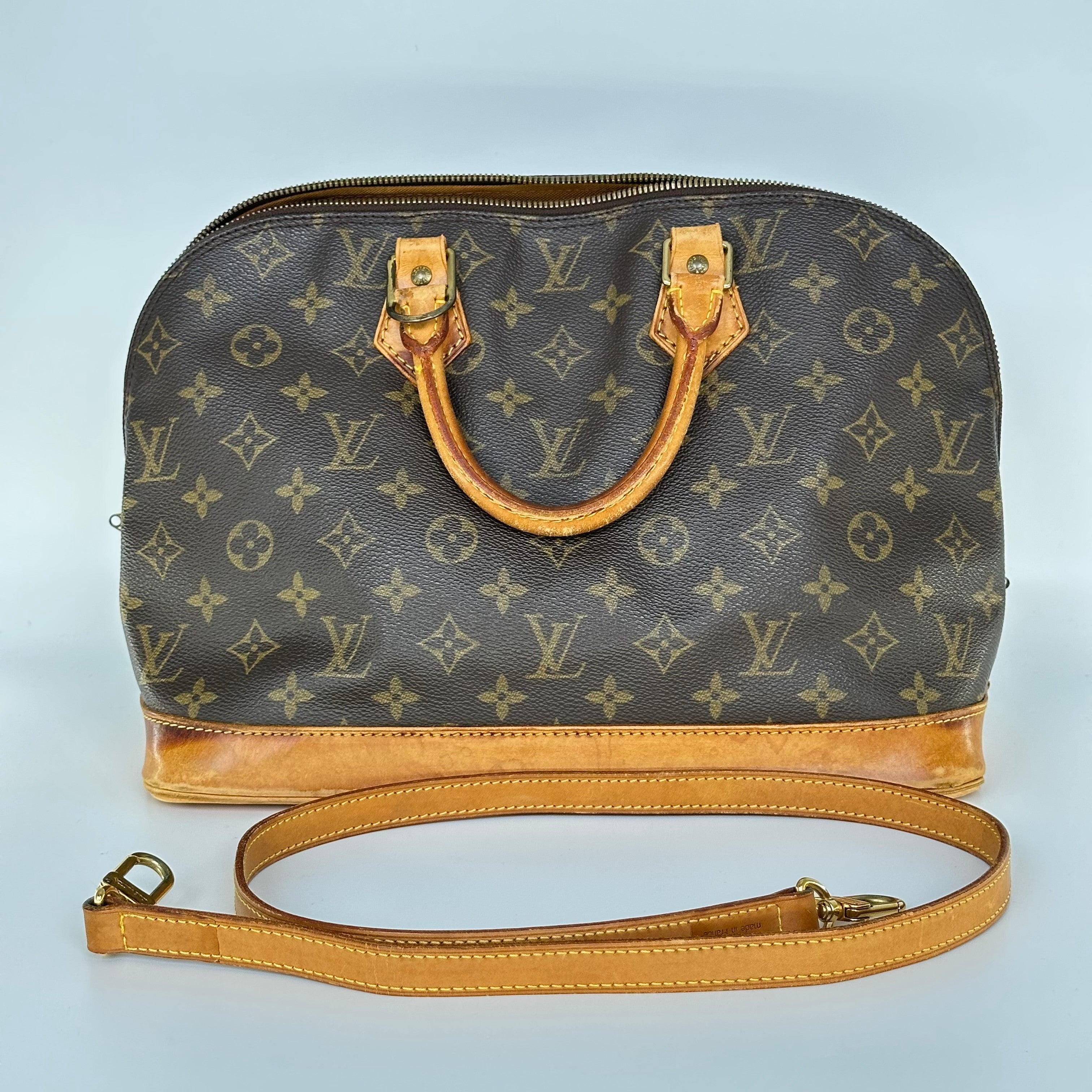 Louis Vuitton Alma Monogram Handbag M51130