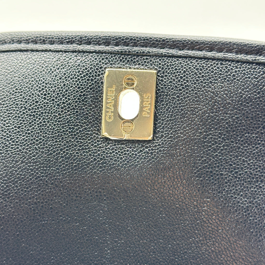 chanel black caviar quilted leather mini round messenger bag