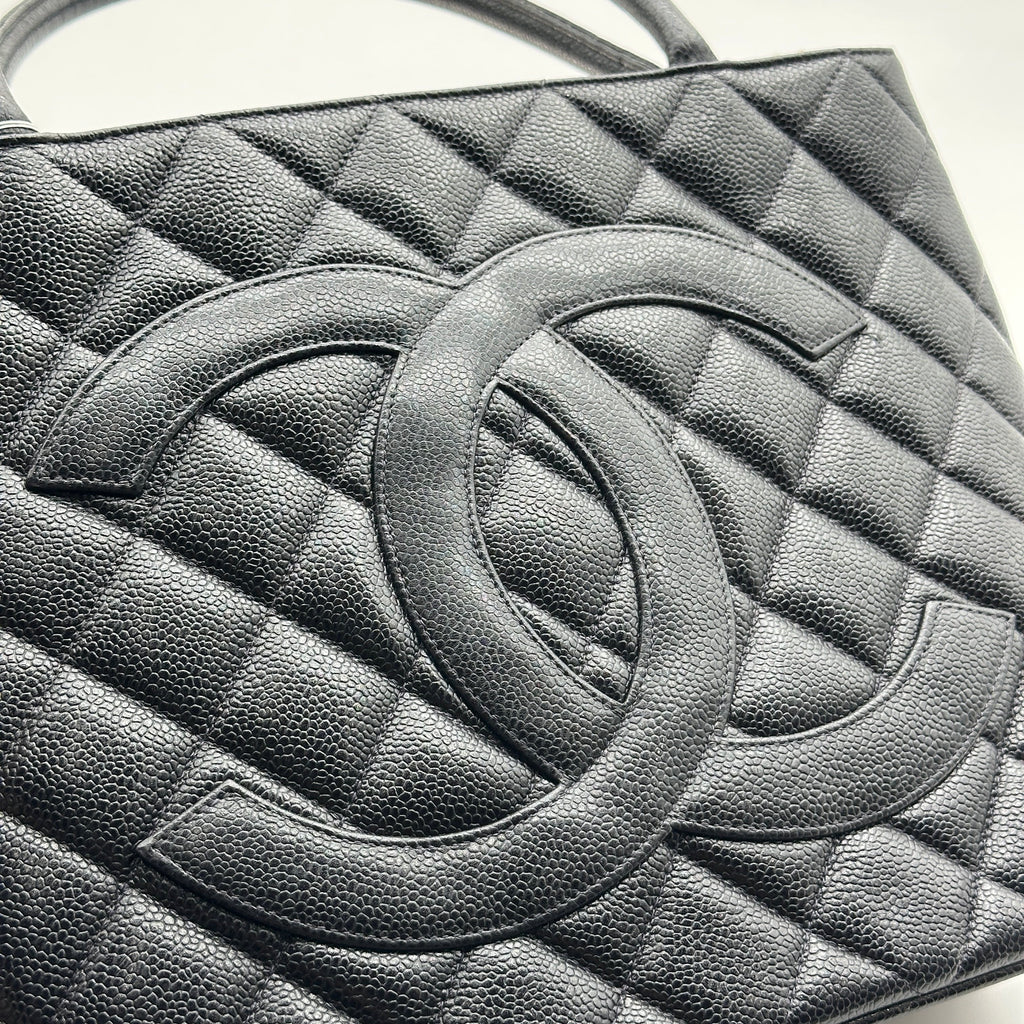 chanel black quilted caviar leather medallion tote bag