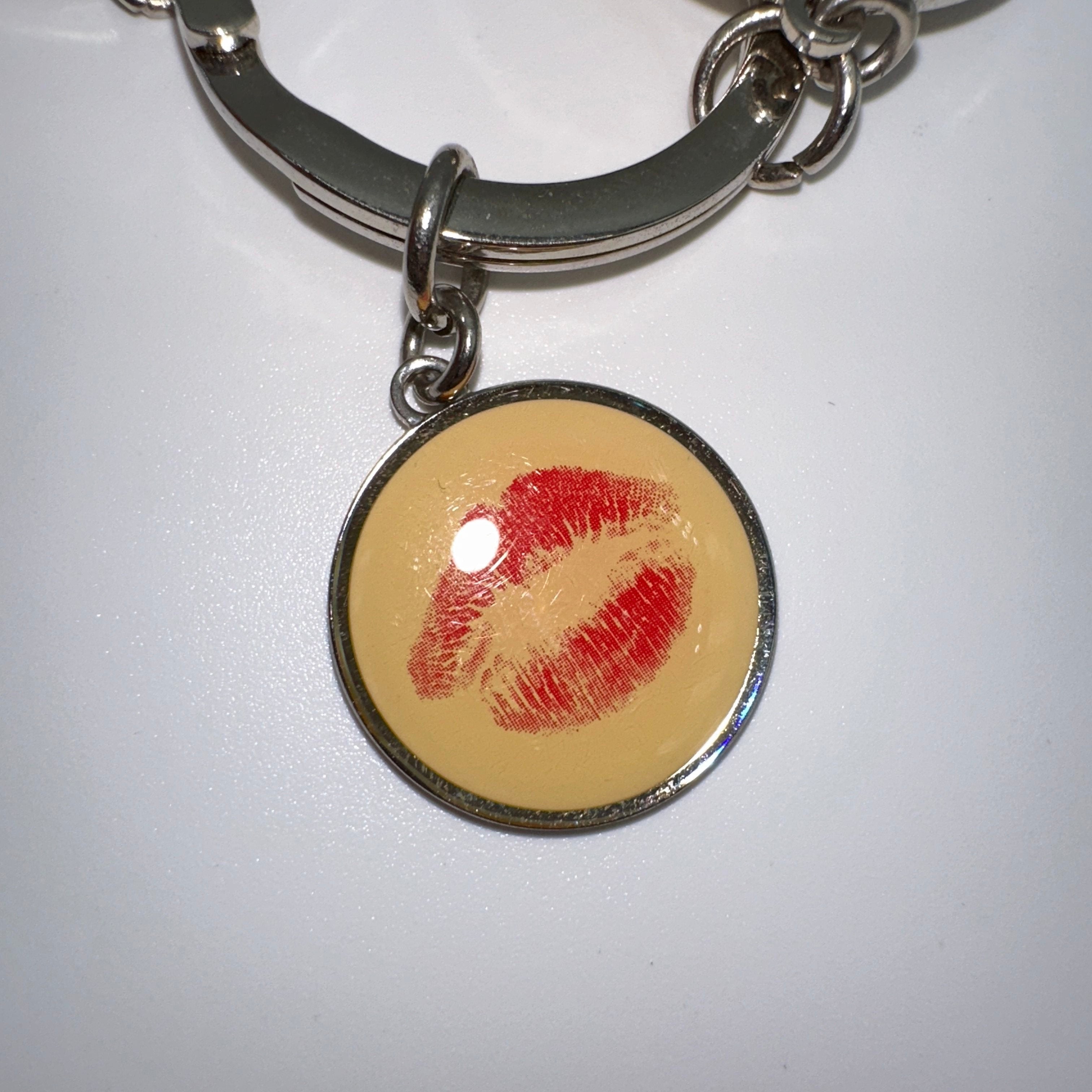 Chanel Silvertone Metal and Resin Rouge Coco Charm Key Chain and Bag Charm