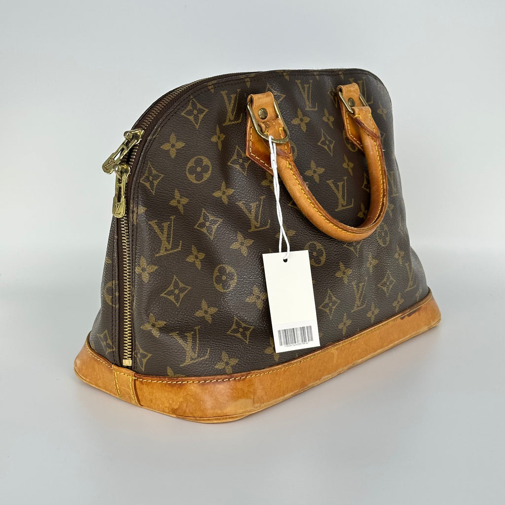 Louis Vuitton Alma Monogram Handbag M51130