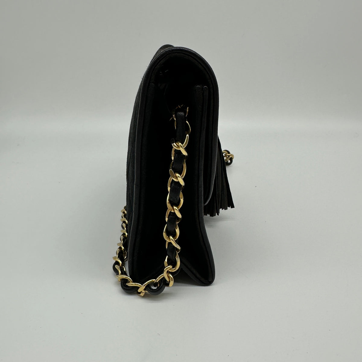 Chanel Quilted Suede Tassel Black Chain Shoulder Bag