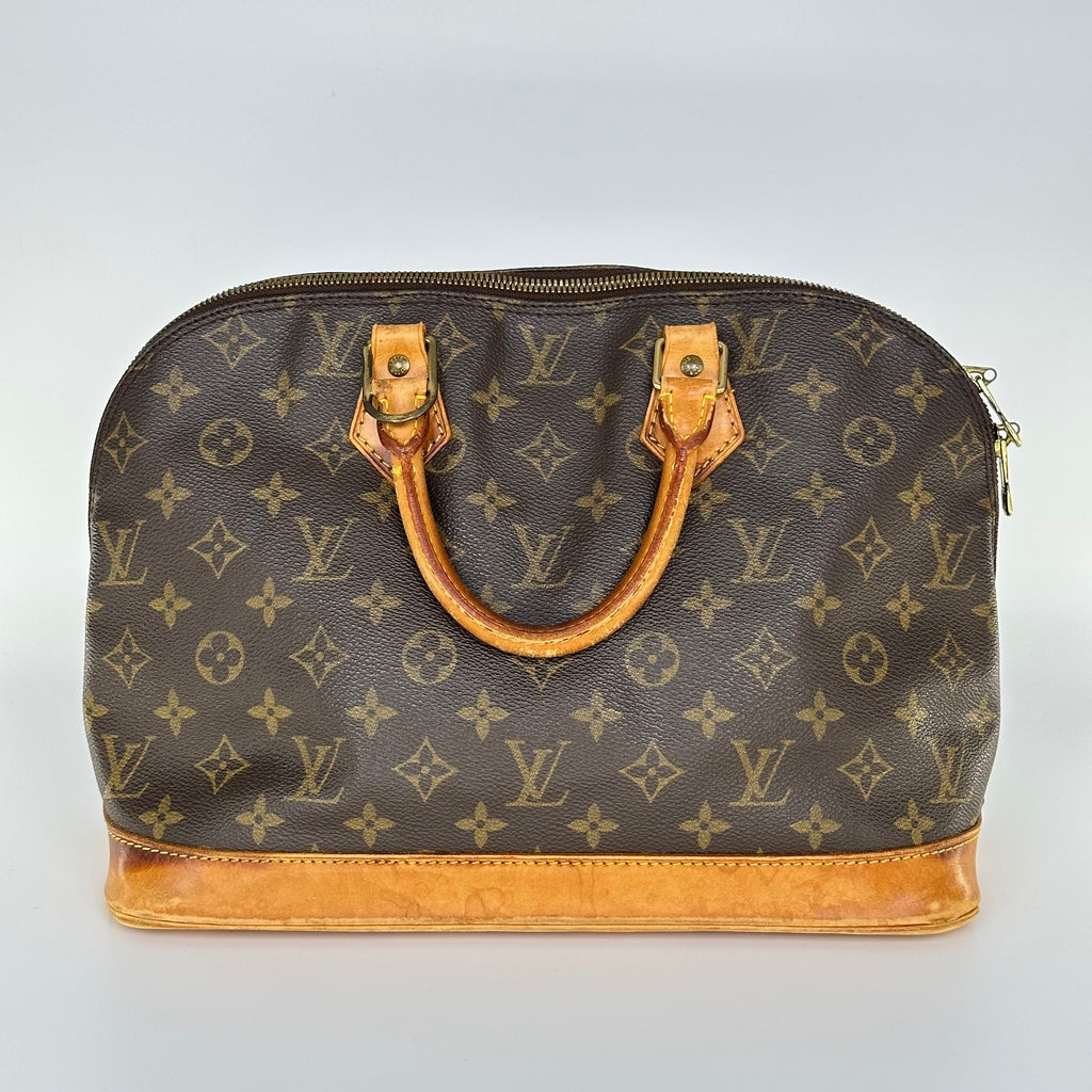 Louis Vuitton Alma Monogram Handbag M51130