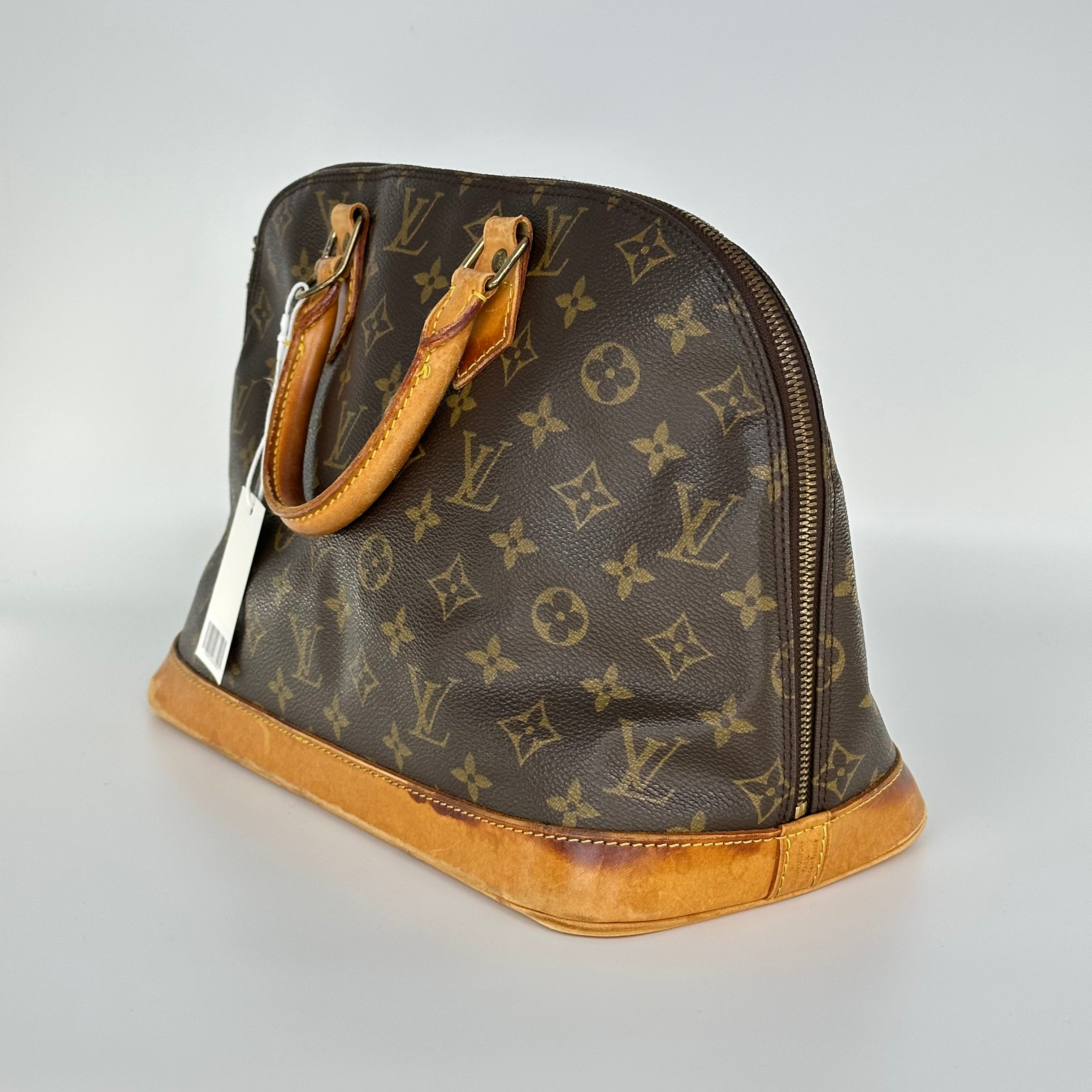 Louis Vuitton Alma Monogram Handbag M51130