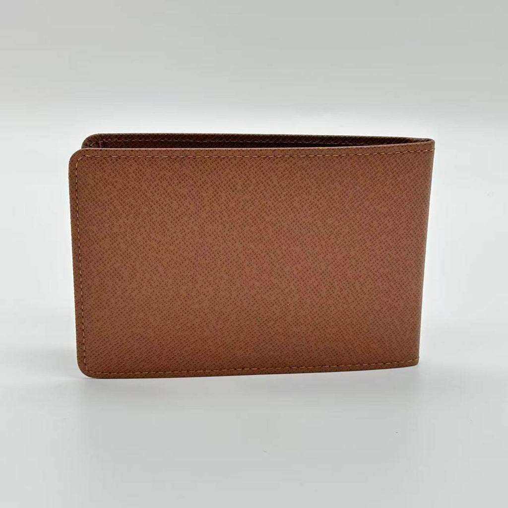 Étui pour porte-cartes en cuir marron Taiga de Louis Vuitton