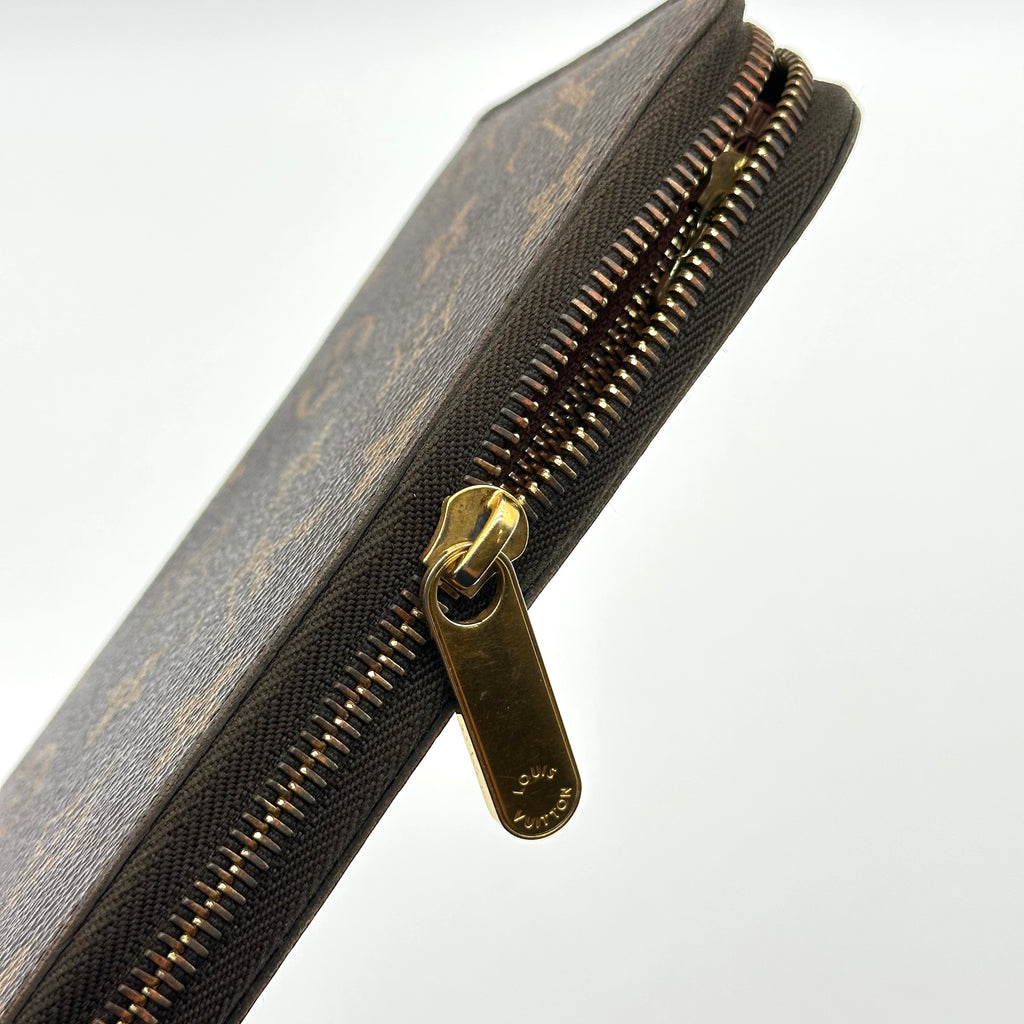 Louis Vuitton Round Wallet Zippy Monogram M60017