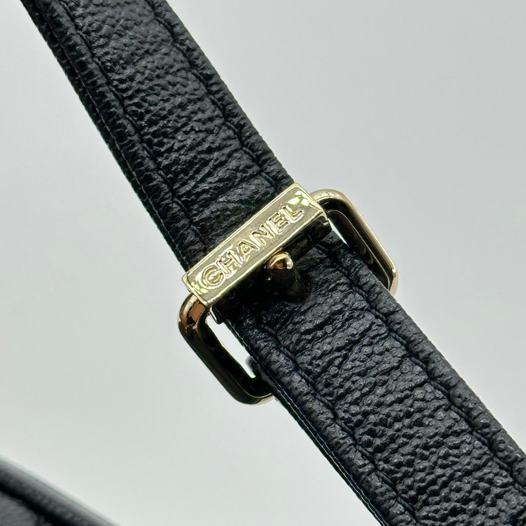 chanel black caviar quilted leather mini round messenger bag