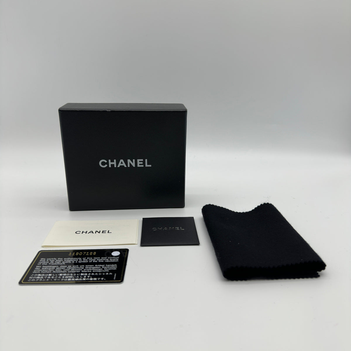 Chanel Icon Line Embossed Leather Metallic Silver Trifold Wallet