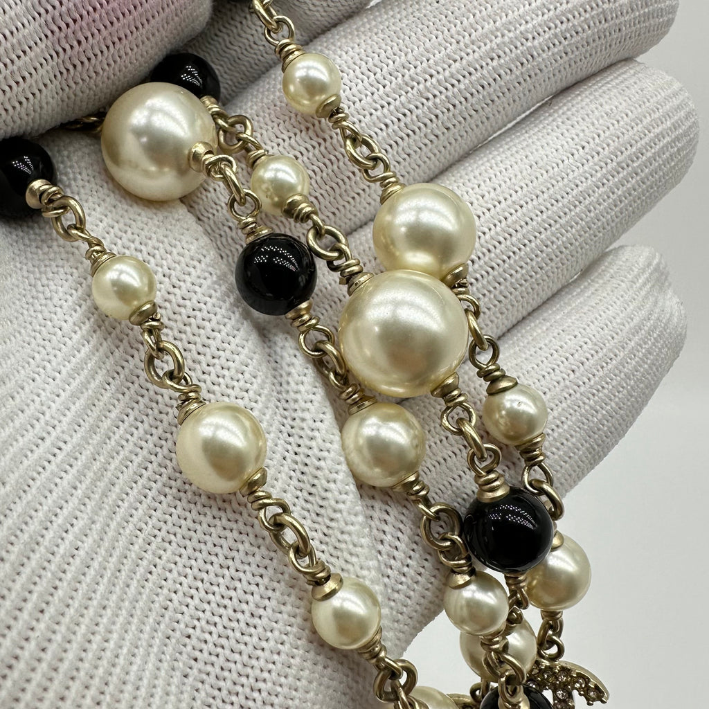 Chanel Black and White Pearl Necklace Sweater Chain
