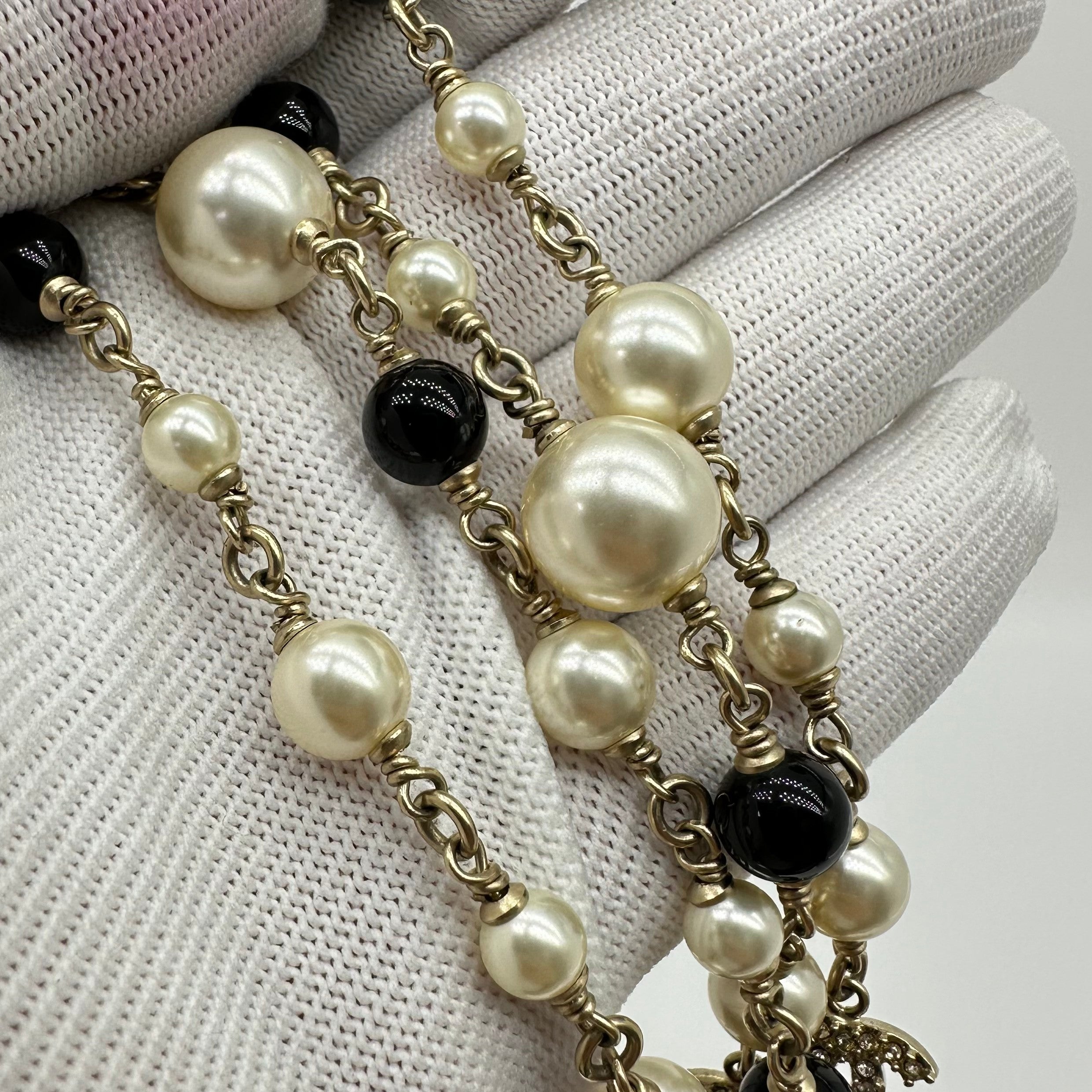 Chanel Black and White Pearl Necklace Sweater Chain