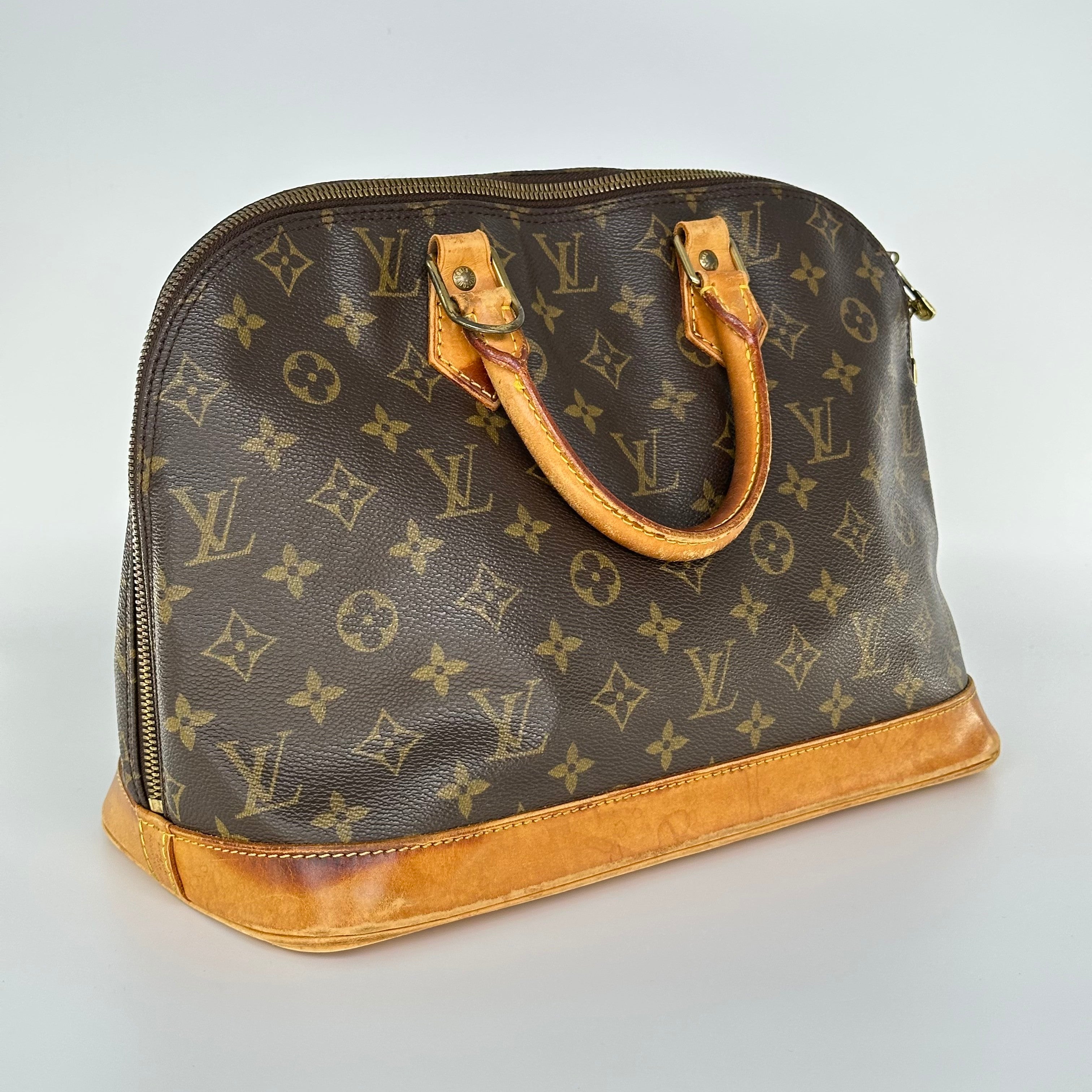 Louis Vuitton Alma Monogram Handbag M51130