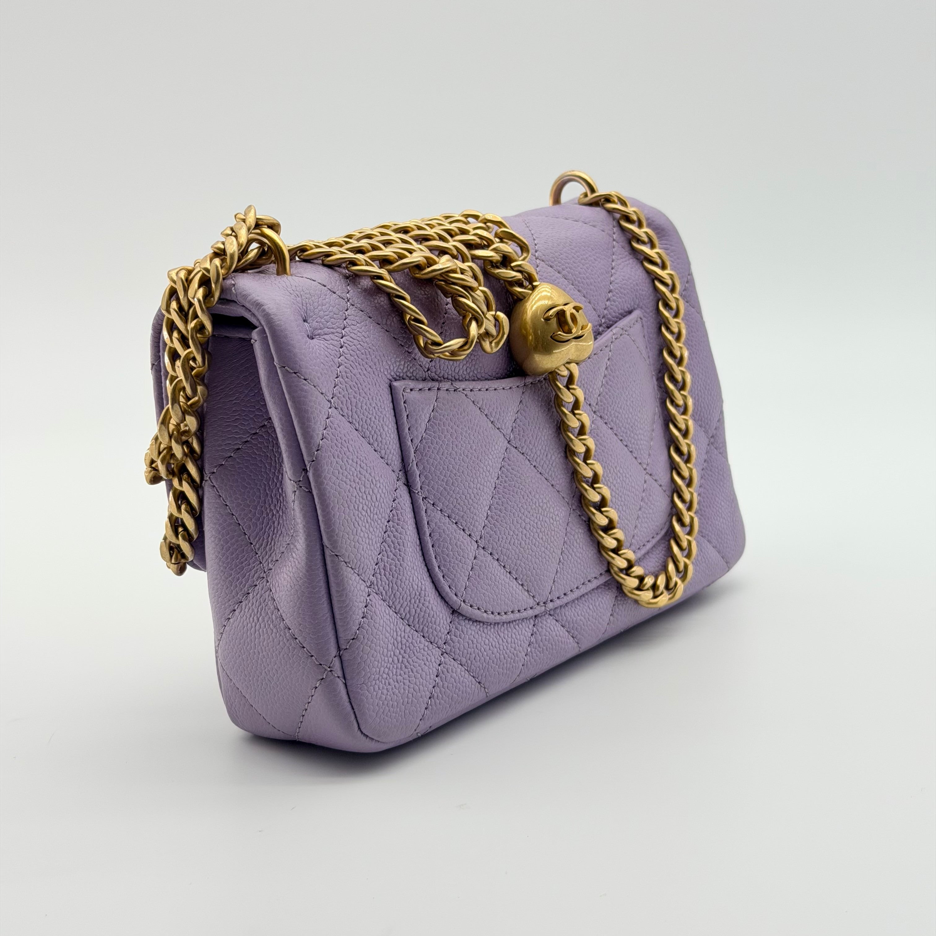 Chanel caviar quilted mini rectangular sweetheart flap light purple