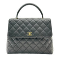 Sac à main Chanel Kelly avec poignée supérieure en cuir Caviar Matériel doré noir Matelasse Série 6