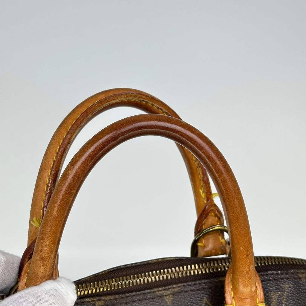 Louis Vuitton Alma Monogram Handbag M51130