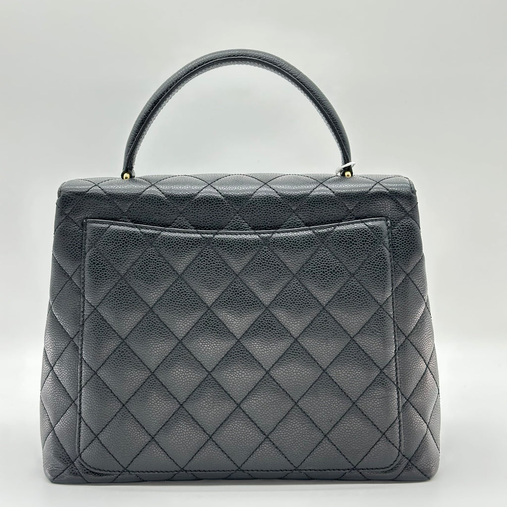 Sac à main Chanel Kelly avec poignée supérieure en cuir Caviar Matériel doré noir Matelasse Série 6