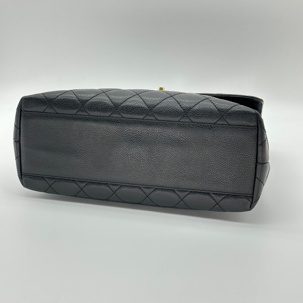 Sac à main Chanel Kelly avec poignée supérieure en cuir Caviar Matériel doré noir Matelasse Série 6