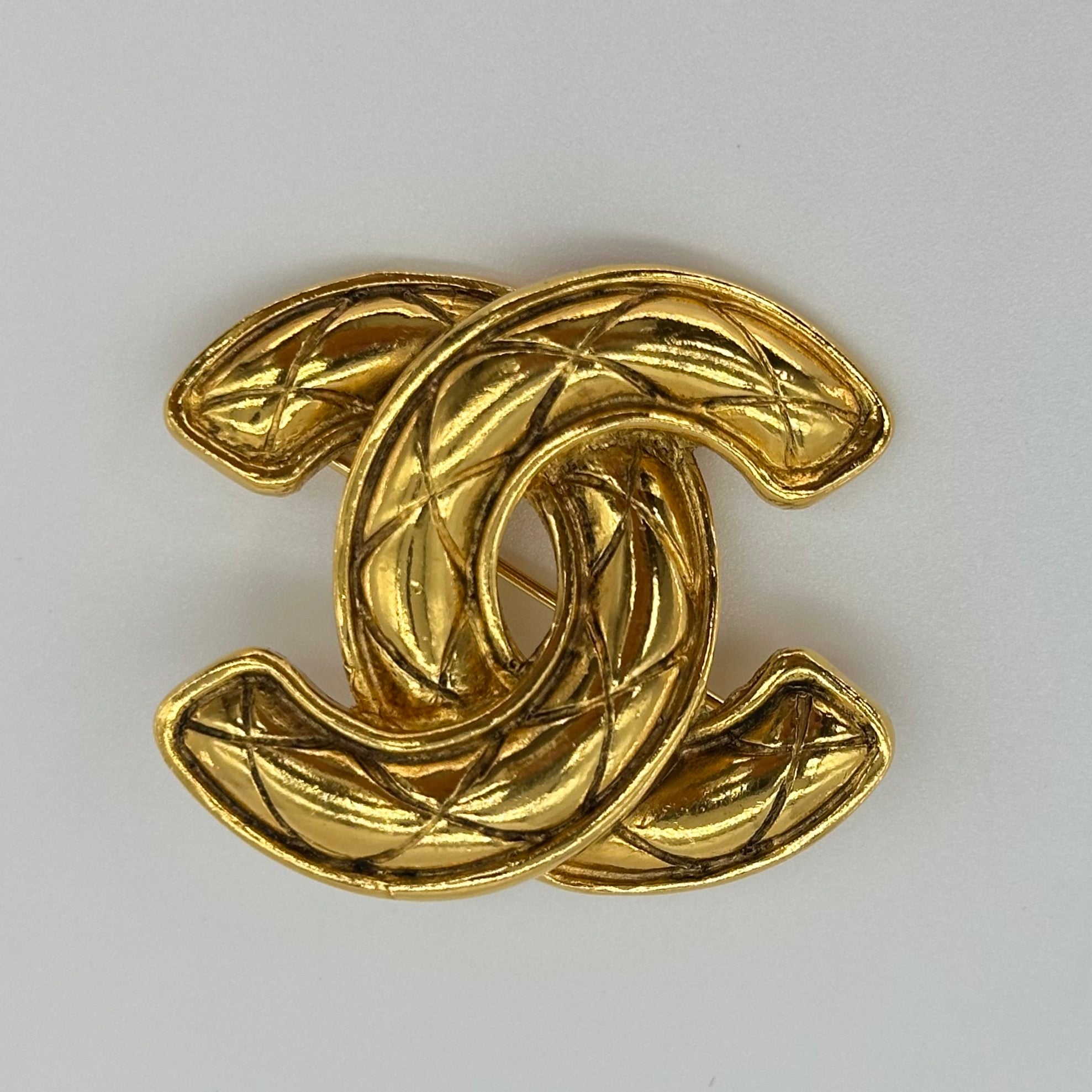 CHANEL Gold Quilted CC Brooch