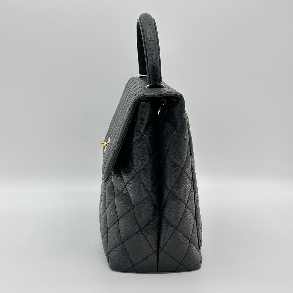 Sac à main Chanel Kelly avec poignée supérieure en cuir Caviar Matériel doré noir Matelasse Série 6